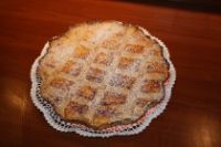 Pastiera batte colomba su tavole pasquali